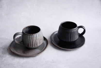 Stoneware carved mug and saucer - black / grey